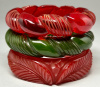 BB485 carved red & green bakelite bangles